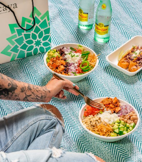 photo of hand eating Tocaya meals